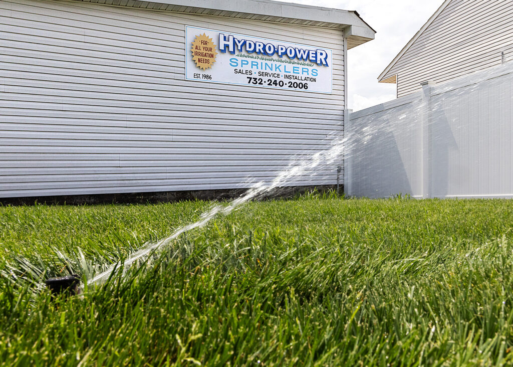 Hydro-Power Sprinklers sign